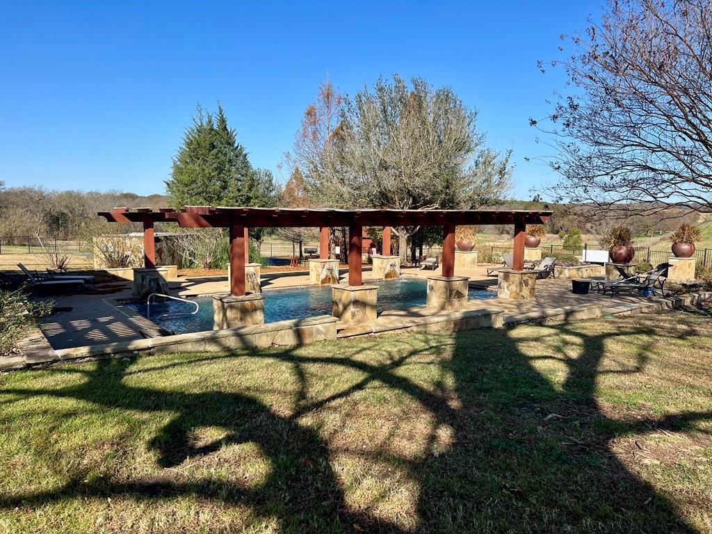 0 Bridle View Court Athens, TX 75752 - Photo 14 of 17 a view of swimming pool with a yard and mountain view