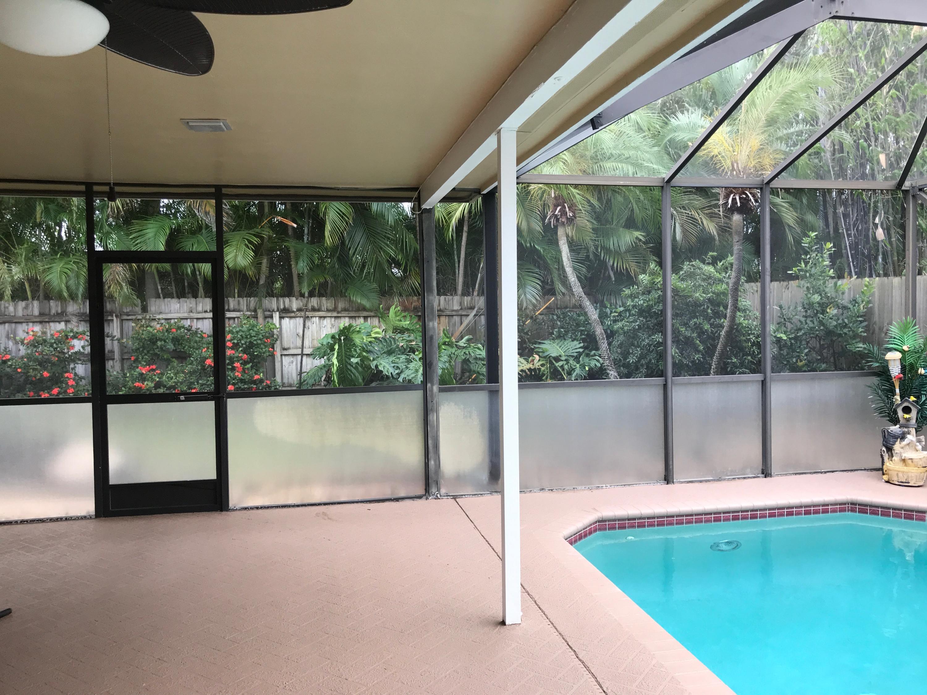 1630 Northwest 7th Street Boca Raton, FL 33486 - Photo 24 of 27 SCREENED PATIO