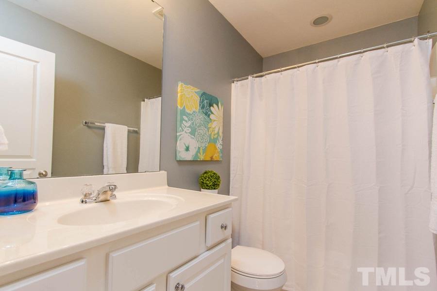 224 Cedar Elm Road Durham, NC 27713 - Photo 11 of 14 With THREE FULL BATHS, this home makes it easy to host.