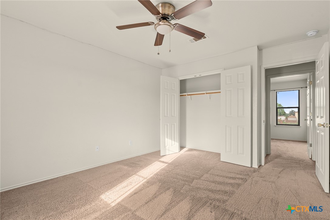 1103 Katelyn Circle Copperas Cove, TX 76522 - Photo 13 of 16 a view of a livingroom with a ceiling fan and window