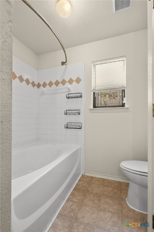 1103 Katelyn Circle Copperas Cove, TX 76522 - Photo 10 of 16 a bathroom with a toilet and a bathtub