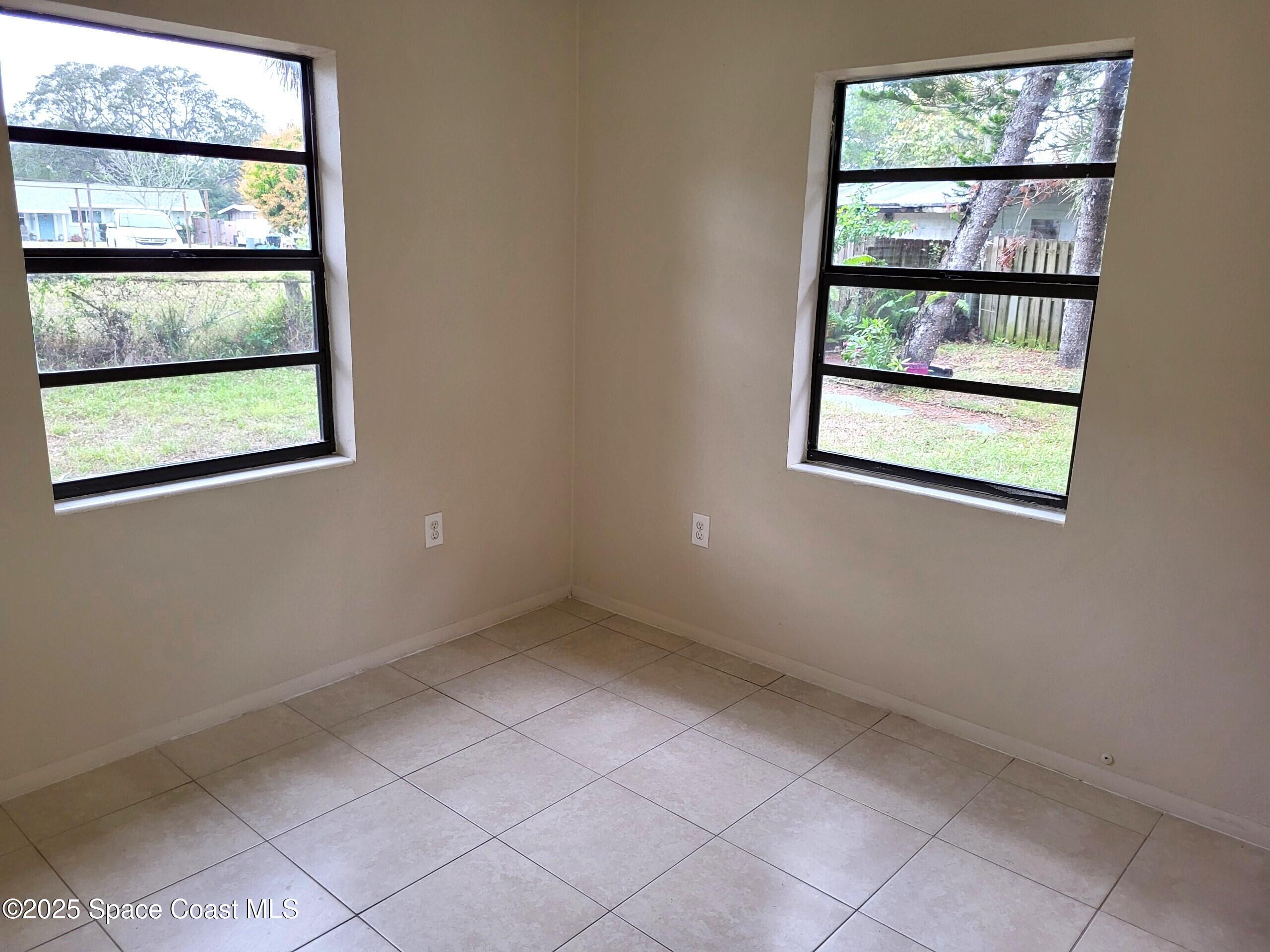 2351 Shenandoah Road Palm Bay, FL 32905 - Photo 17 of 28 an empty room with a window