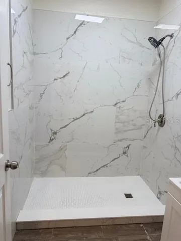 a bathroom with a bath tub