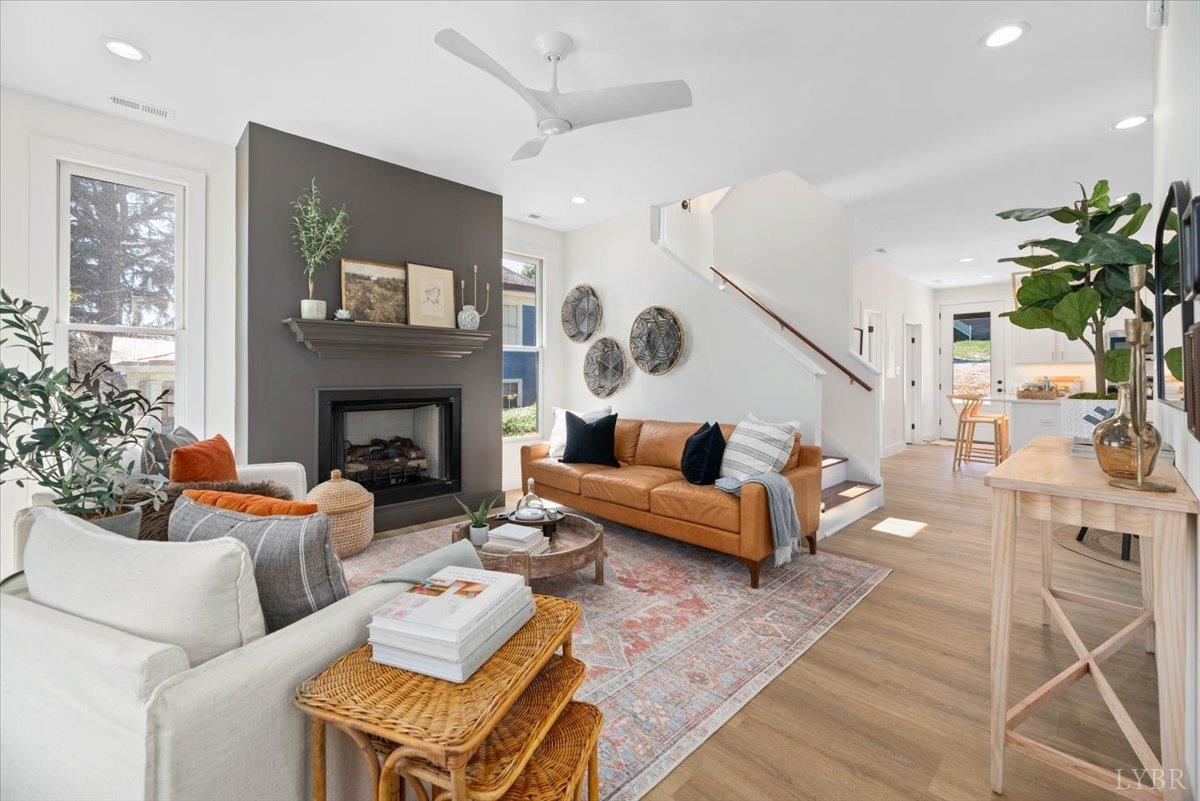 1101 Harrison Street Lynchburg, VA 24504 - Photo 11 of 66 a living room with furniture and a fireplace