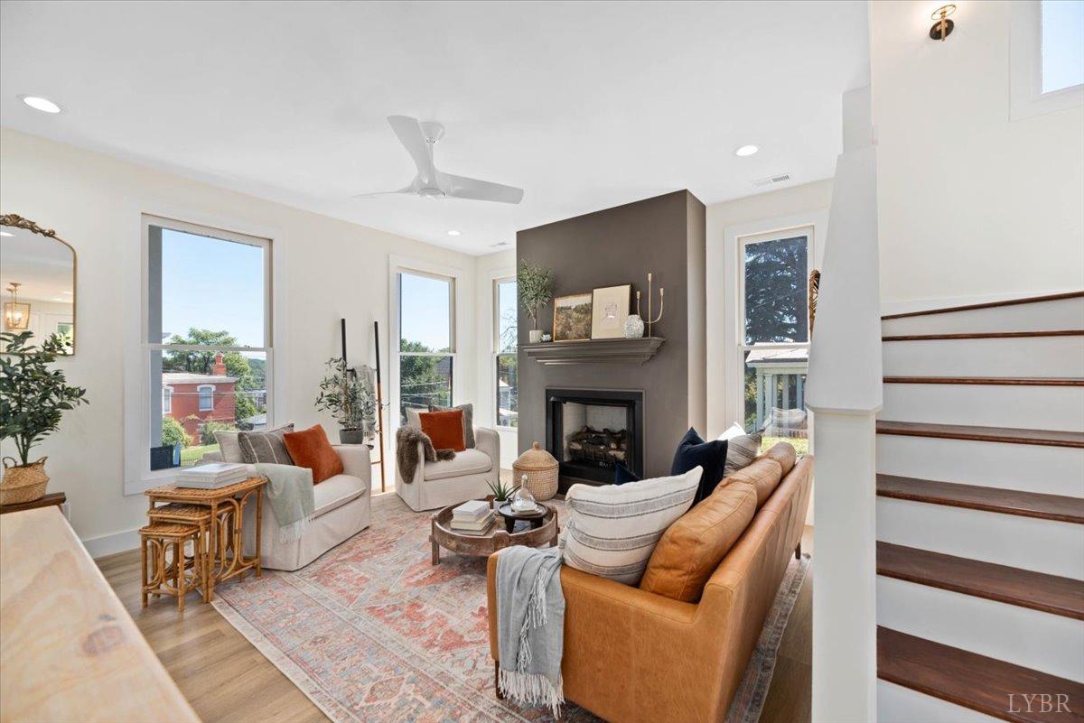 1101 Harrison Street Lynchburg, VA 24504 - Photo 14 of 66 a living room with furniture and a fireplace