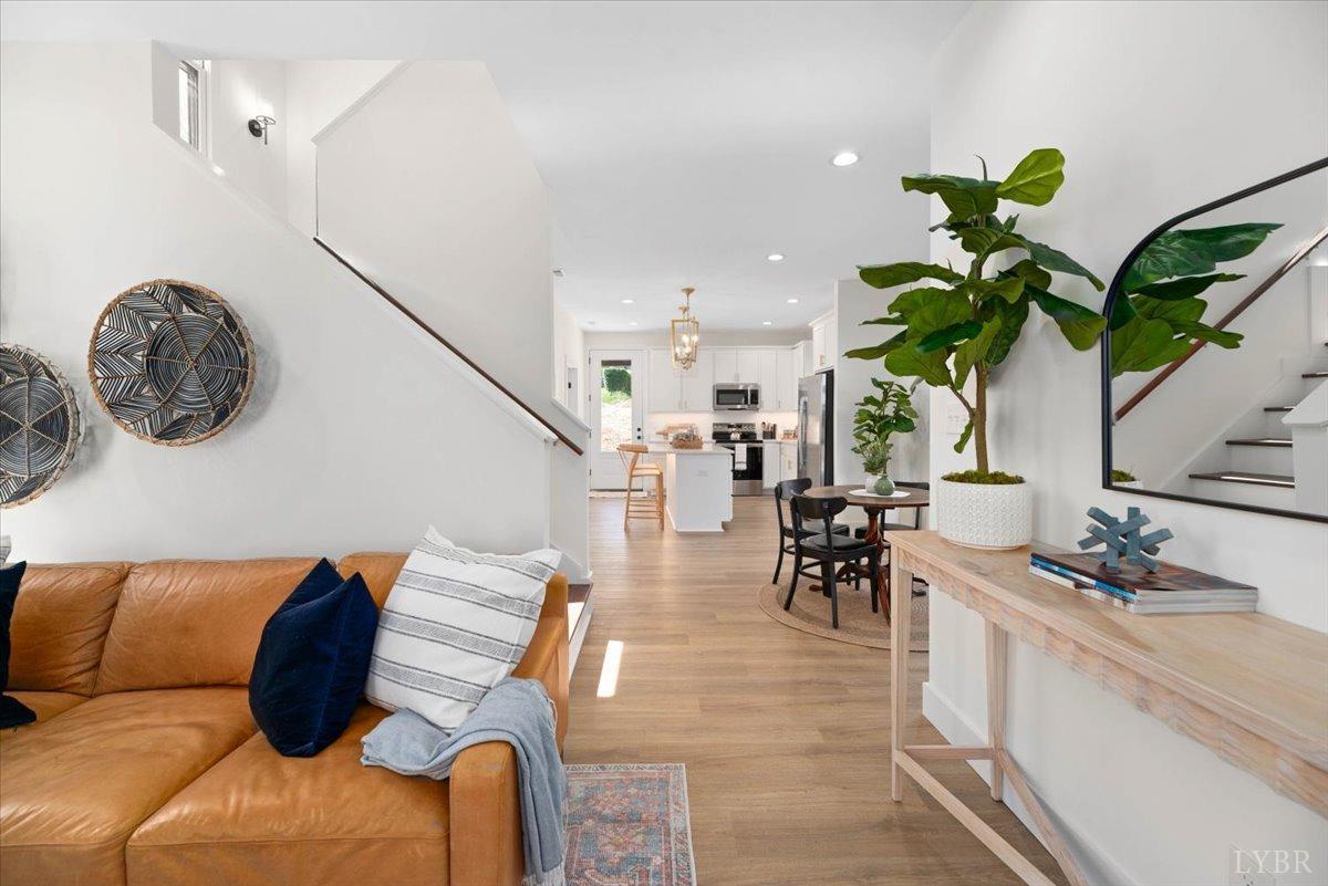 1101 Harrison Street Lynchburg, VA 24504 - Photo 15 of 66 a living room with furniture flowerpot and wooden floor