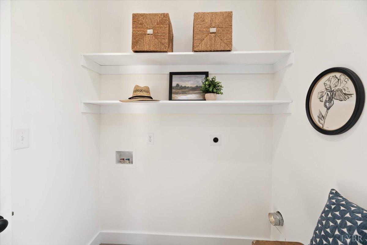 1101 Harrison Street Lynchburg, VA 24504 - Photo 22 of 66 a bathroom with a bathtub and a window