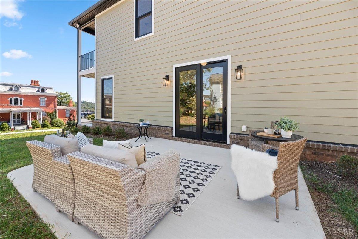 1101 Harrison Street Lynchburg, VA 24504 - Photo 29 of 66 a view of a patio with couches and potted plants