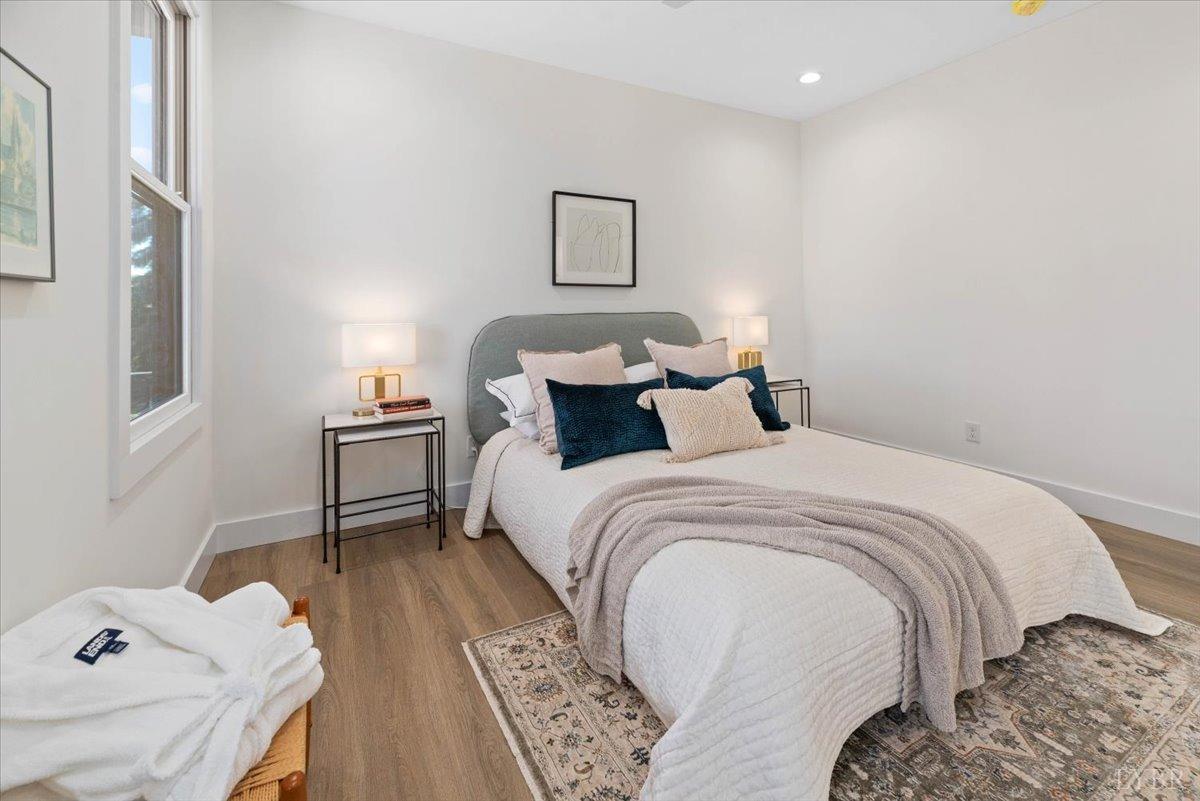 1101 Harrison Street Lynchburg, VA 24504 - Photo 36 of 66 a bedroom with a bed and a table in it