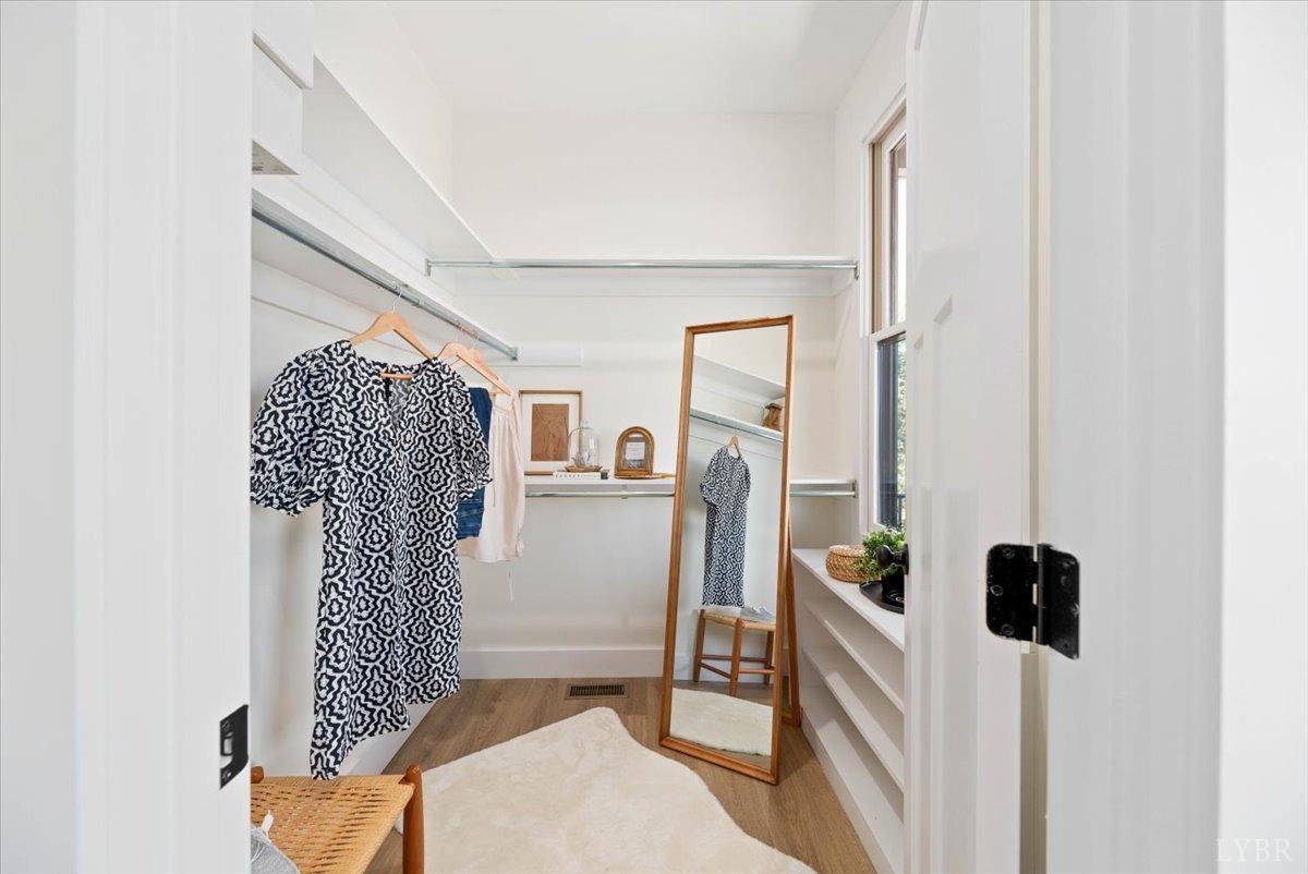 1101 Harrison Street Lynchburg, VA 24504 - Photo 38 of 66 a view of walk in closet with clothes and shoes
