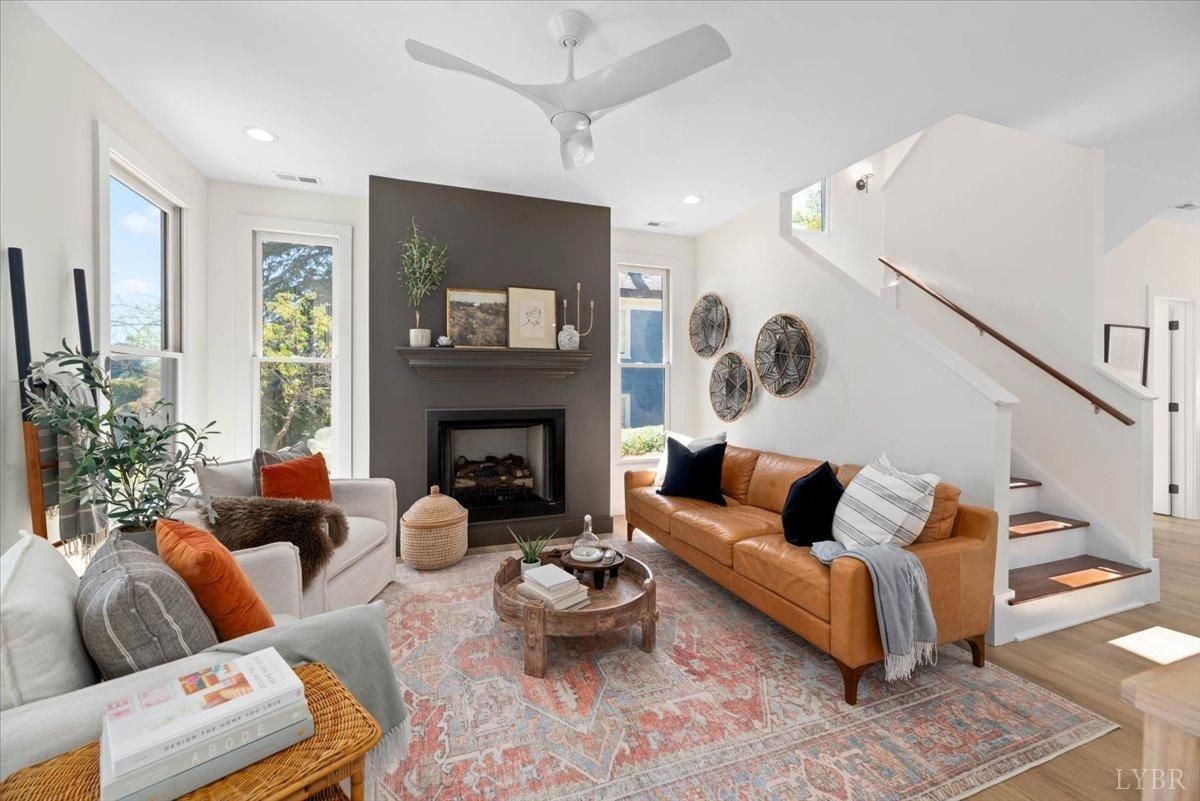 1101 Harrison Street Lynchburg, VA 24504 - Photo 8 of 66 a living room with furniture and a fireplace