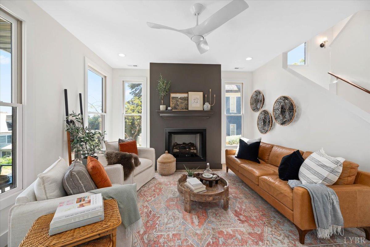 1101 Harrison Street Lynchburg, VA 24504 - Photo 9 of 66 a living room with furniture and a fireplace