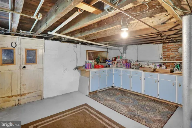 a view of storage and utility room