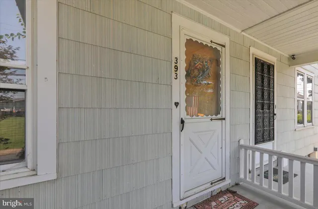 a bathroom with a glass door shower