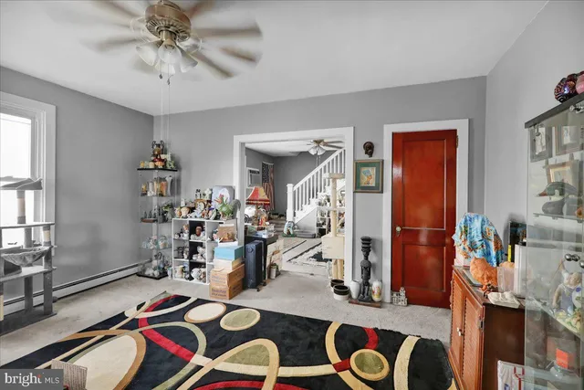 a view of gym equipment with clothes and toys