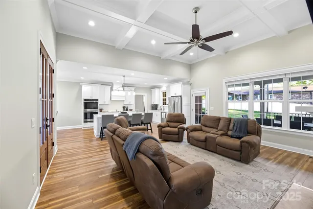 a living room with furniture or outdoor view and a large window