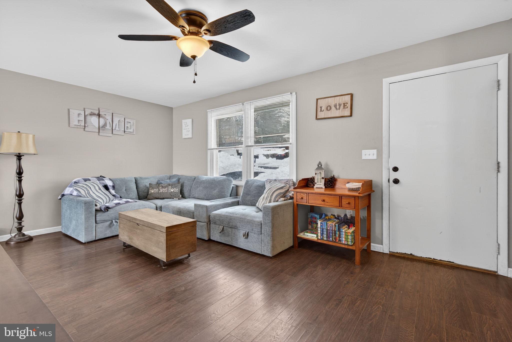 311 Fulton Street Akron, PA 17501 - Photo 12 of 30 a living room with furniture and a wooden floor