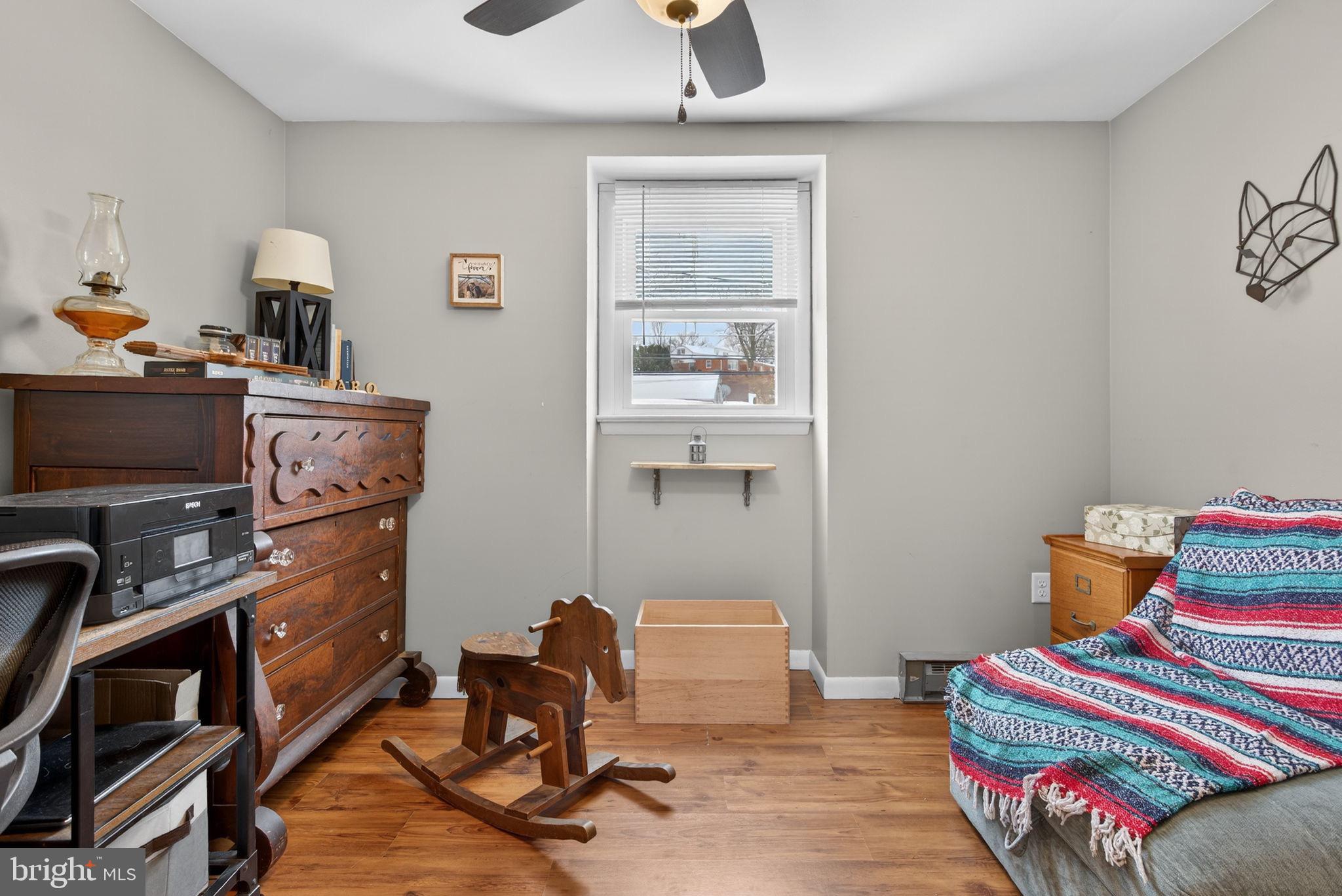 311 Fulton Street Akron, PA 17501 - Photo 21 of 30 a work room with furniture and wooden floor
