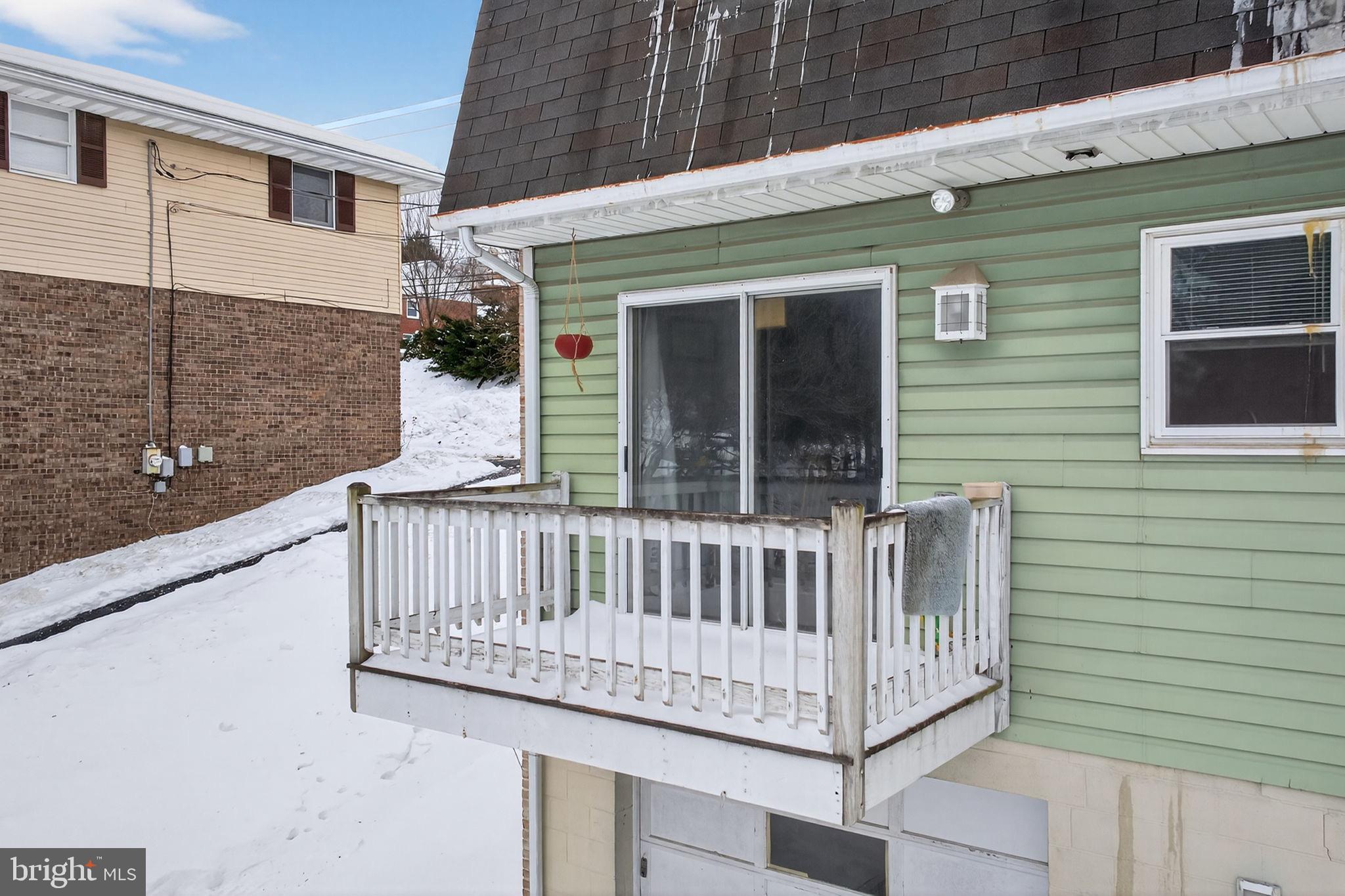 311 Fulton Street Akron, PA 17501 - Photo 24 of 30 a view of a wooden deck front of house