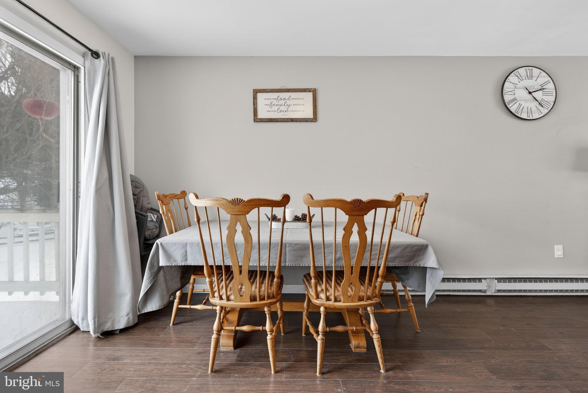311 Fulton Street Akron, PA 17501 - Photo 10 of 30 a view of a dining room with furniture and wooden floor