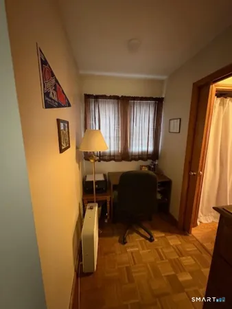 a room with furniture and a window