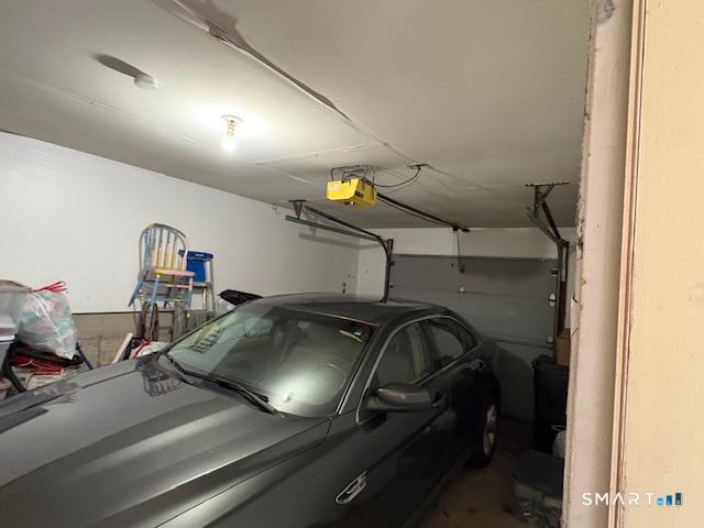 128 Lyman Road, Unit 24 Wolcott, CT 06716 - Photo 4 of 13 a car parked in a parking lot