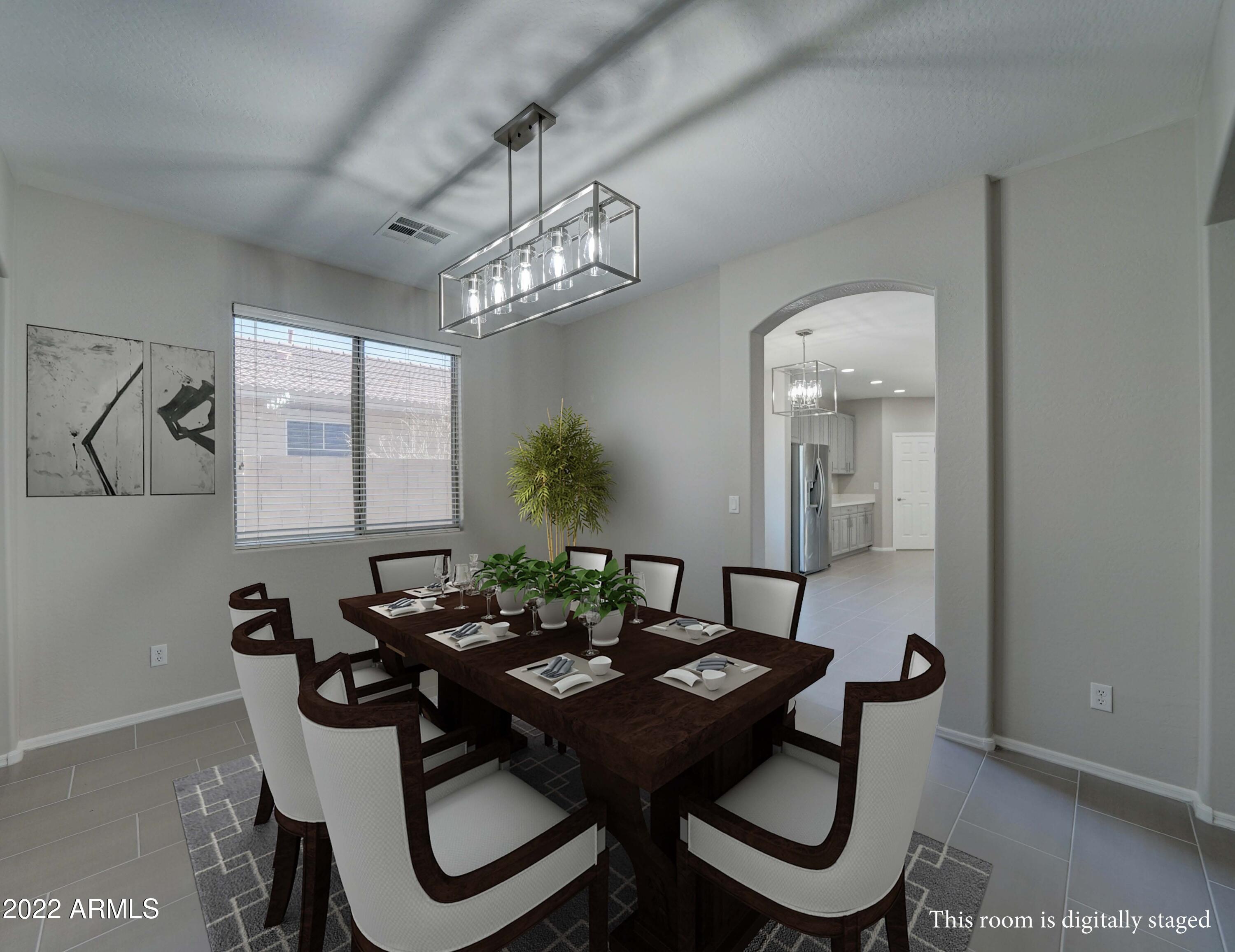 6827 West St Catherine Avenue Laveen, AZ 85339 - Photo 16 of 58 Dining Room Digitally Staged