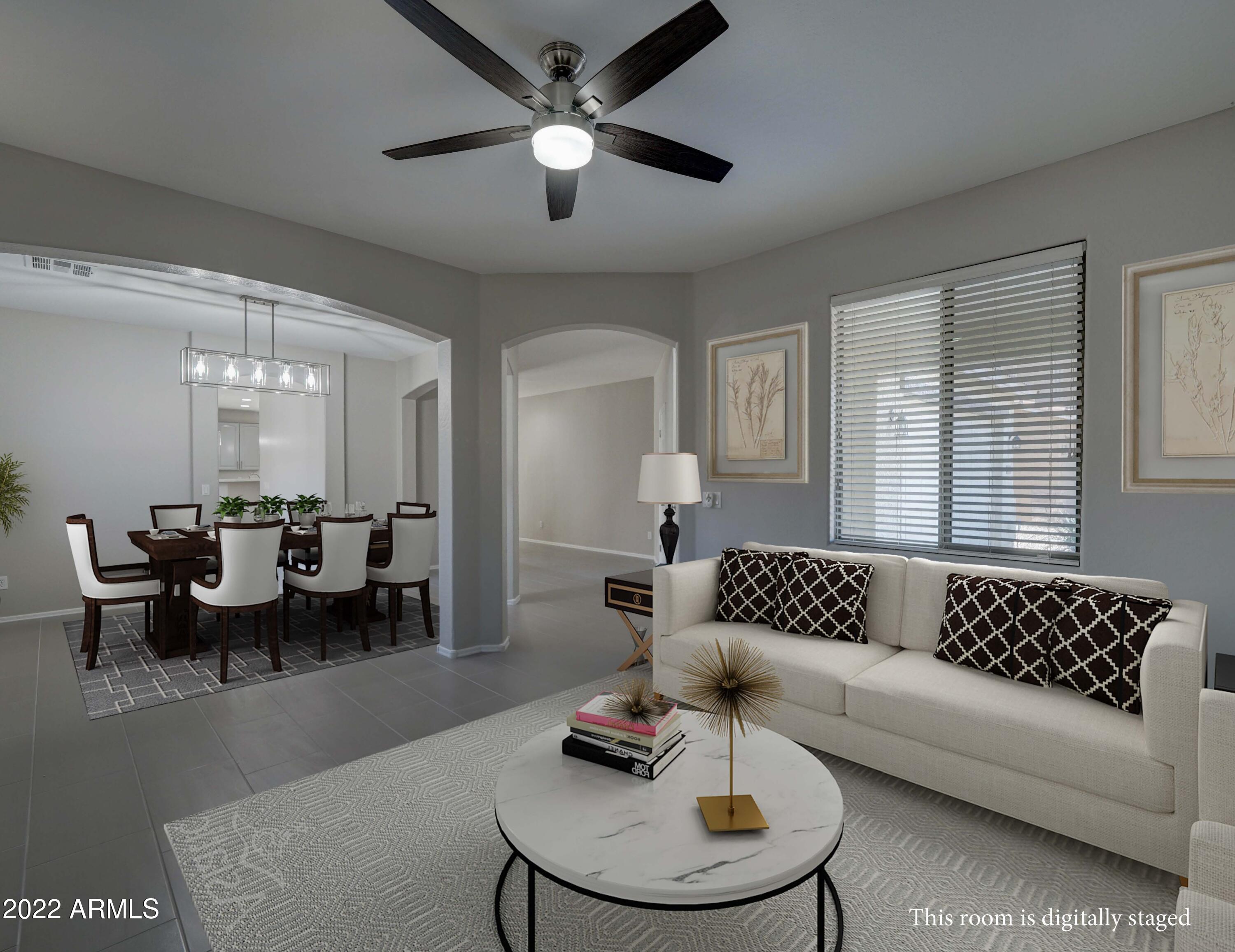 6827 West St Catherine Avenue Laveen, AZ 85339 - Photo 18 of 58 Sitting Room and Dining Room Digitally S