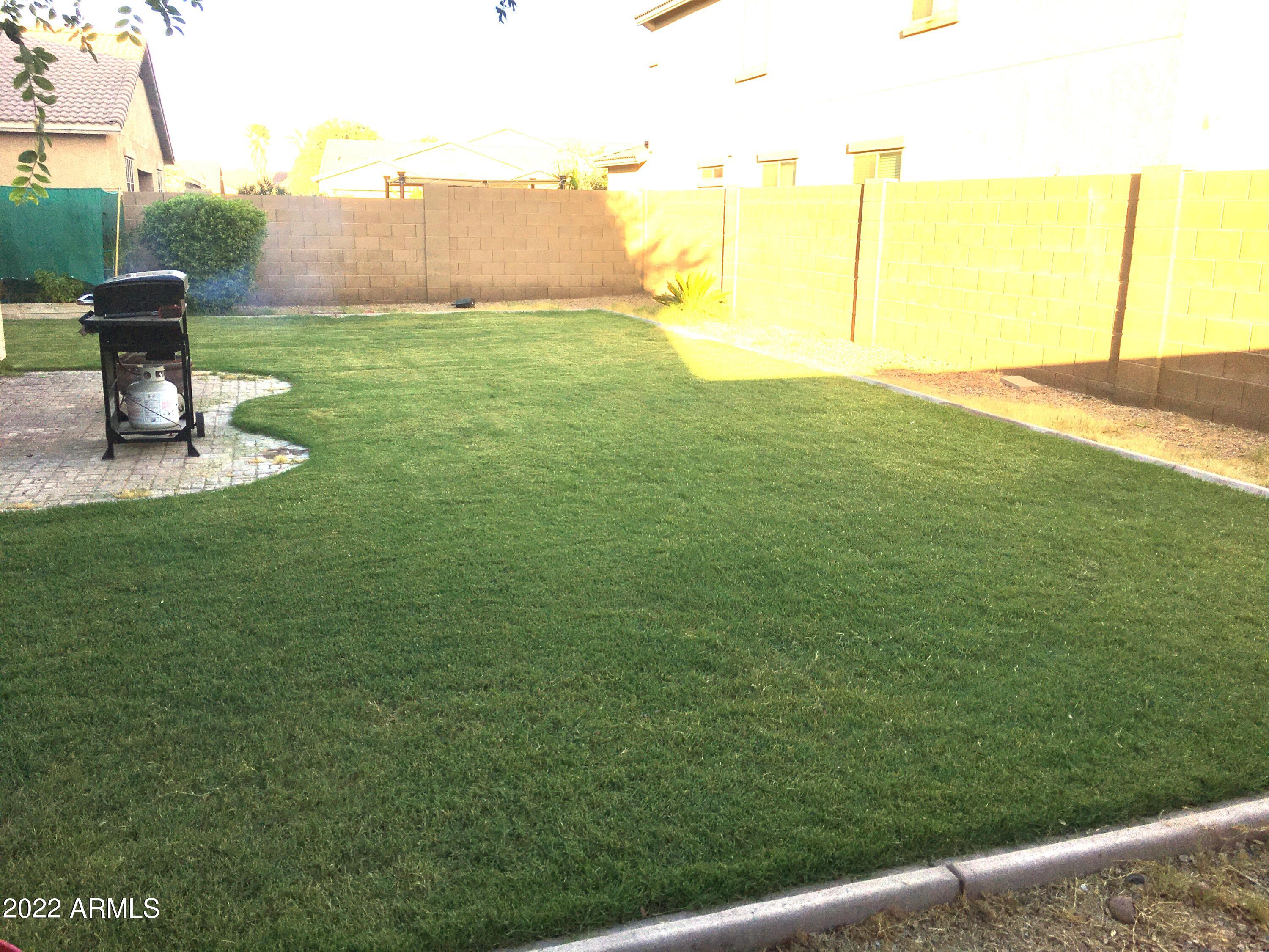 6827 West St Catherine Avenue Laveen, AZ 85339 - Photo 50 of 58 Adjusted Grass Picture