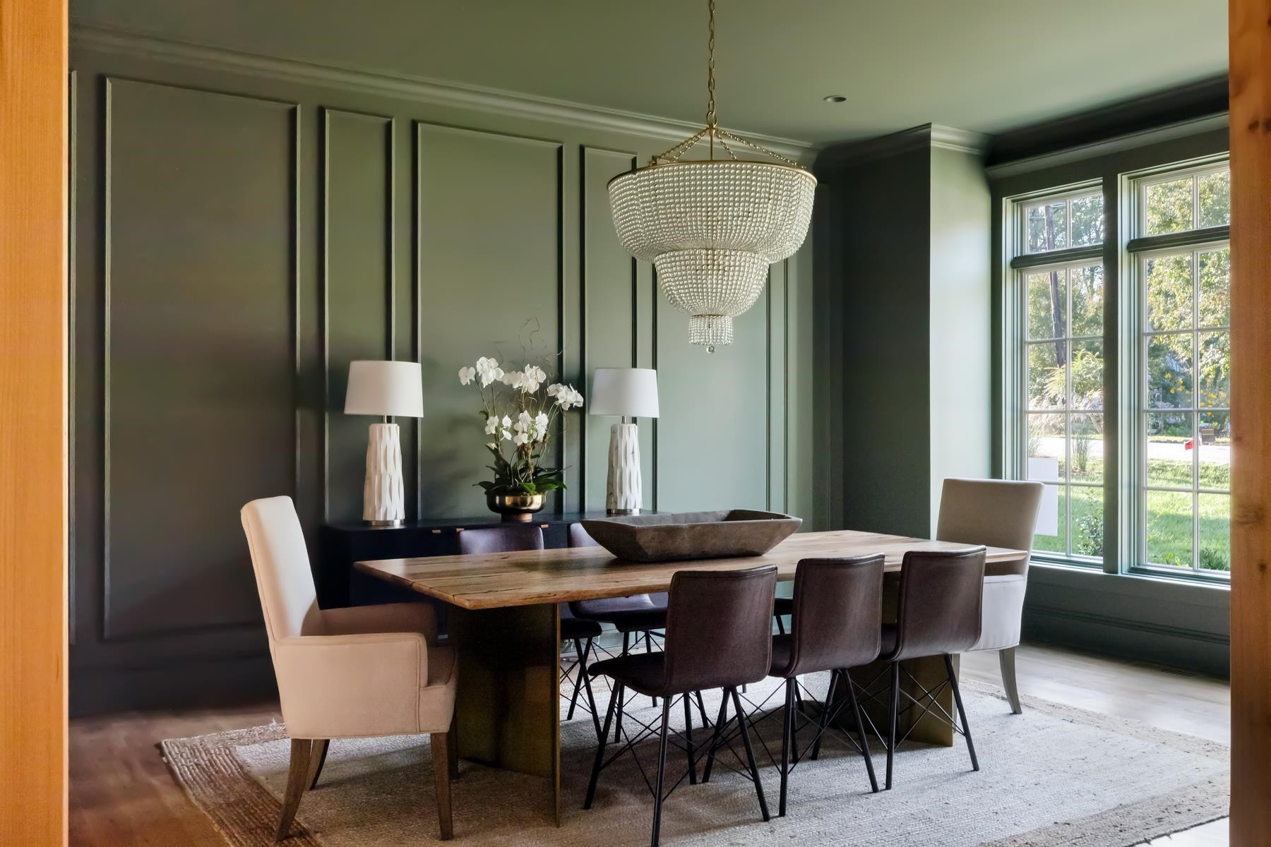 727 Lake Boone Trail Raleigh, NC 27607 - Photo 11 of 100 a dining room with furniture a chandelier and window
