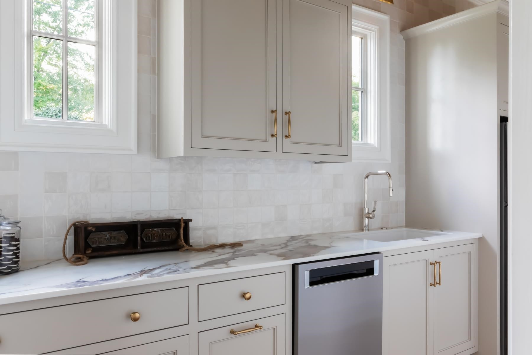 727 Lake Boone Trail Raleigh, NC 27607 - Photo 23 of 100 a kitchen with granite countertop white cabinets and a window