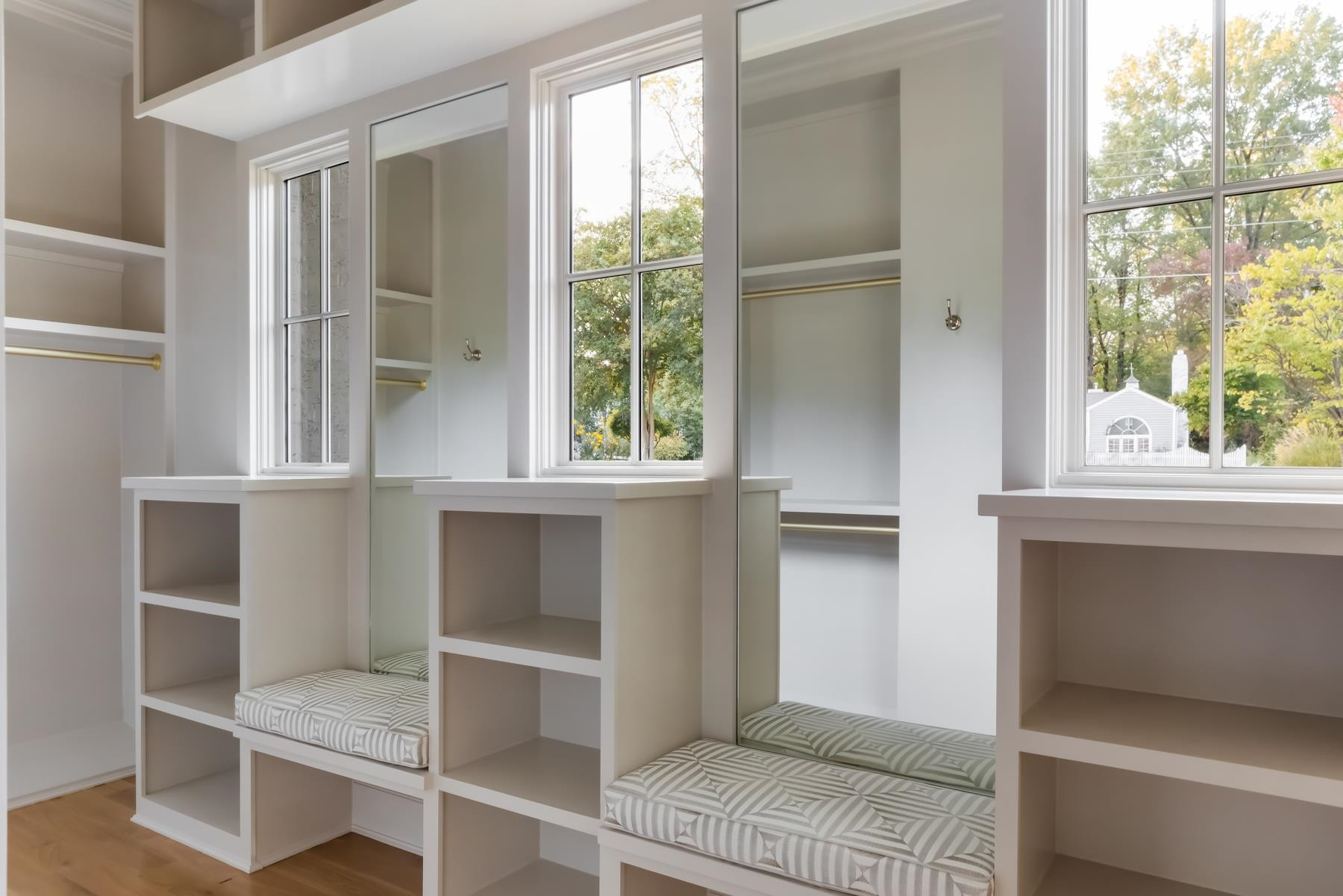 727 Lake Boone Trail Raleigh, NC 27607 - Photo 48 of 100 a view of an empty room with wooden floor and a window
