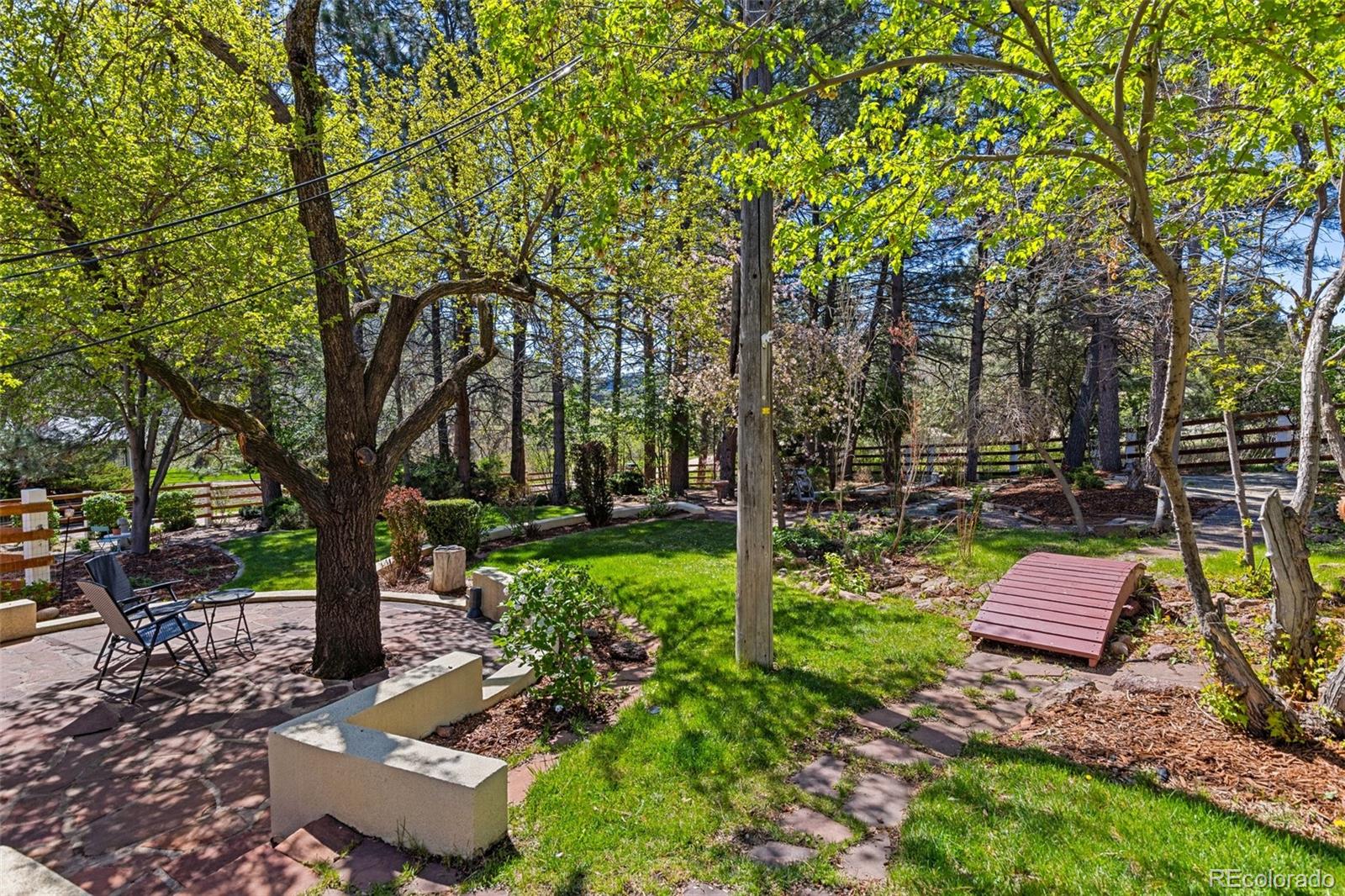 1669 Apple Valley Road Lyons, CO 80540 - Photo 11 of 48 a view of backyard with sitting area