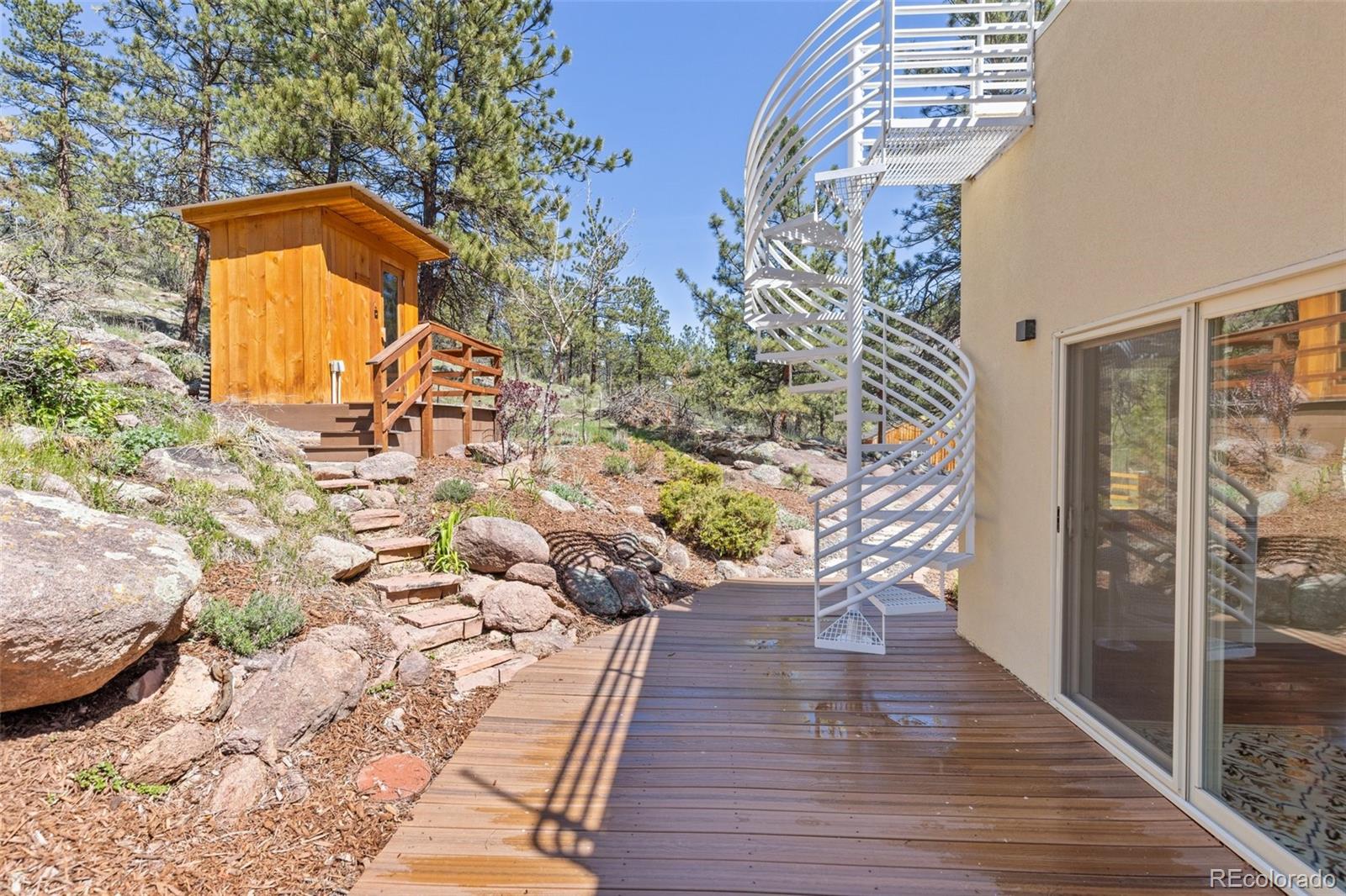 1669 Apple Valley Road Lyons, CO 80540 - Photo 16 of 48 a view of entryway with wooden floor