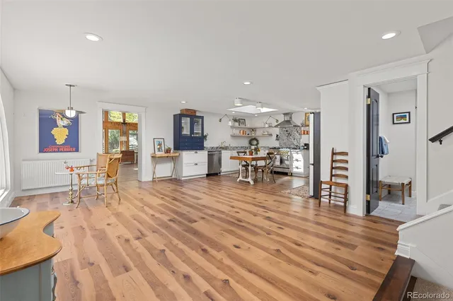 a view of a living room and dining room