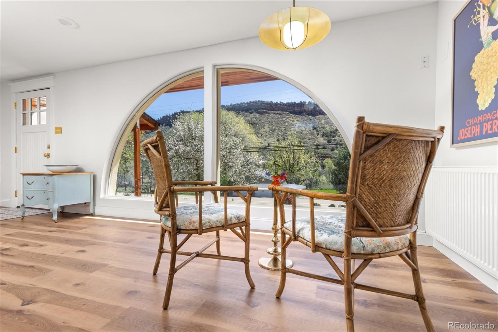 1669 Apple Valley Road Lyons, CO 80540 - Photo 20 of 48 a view of an chairs and table in a room