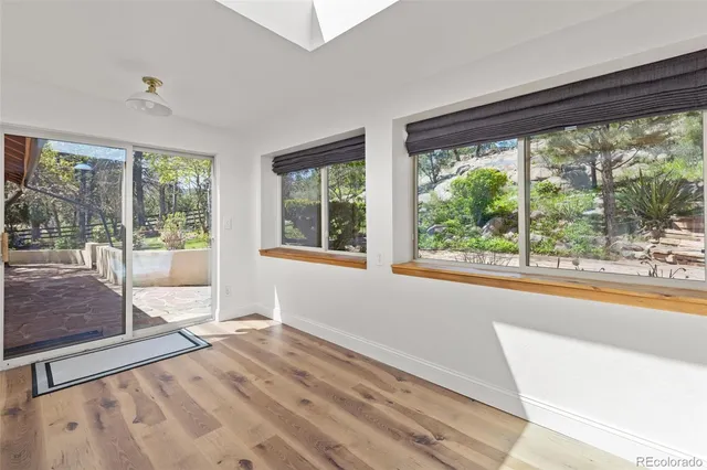 a view of a room with a large window