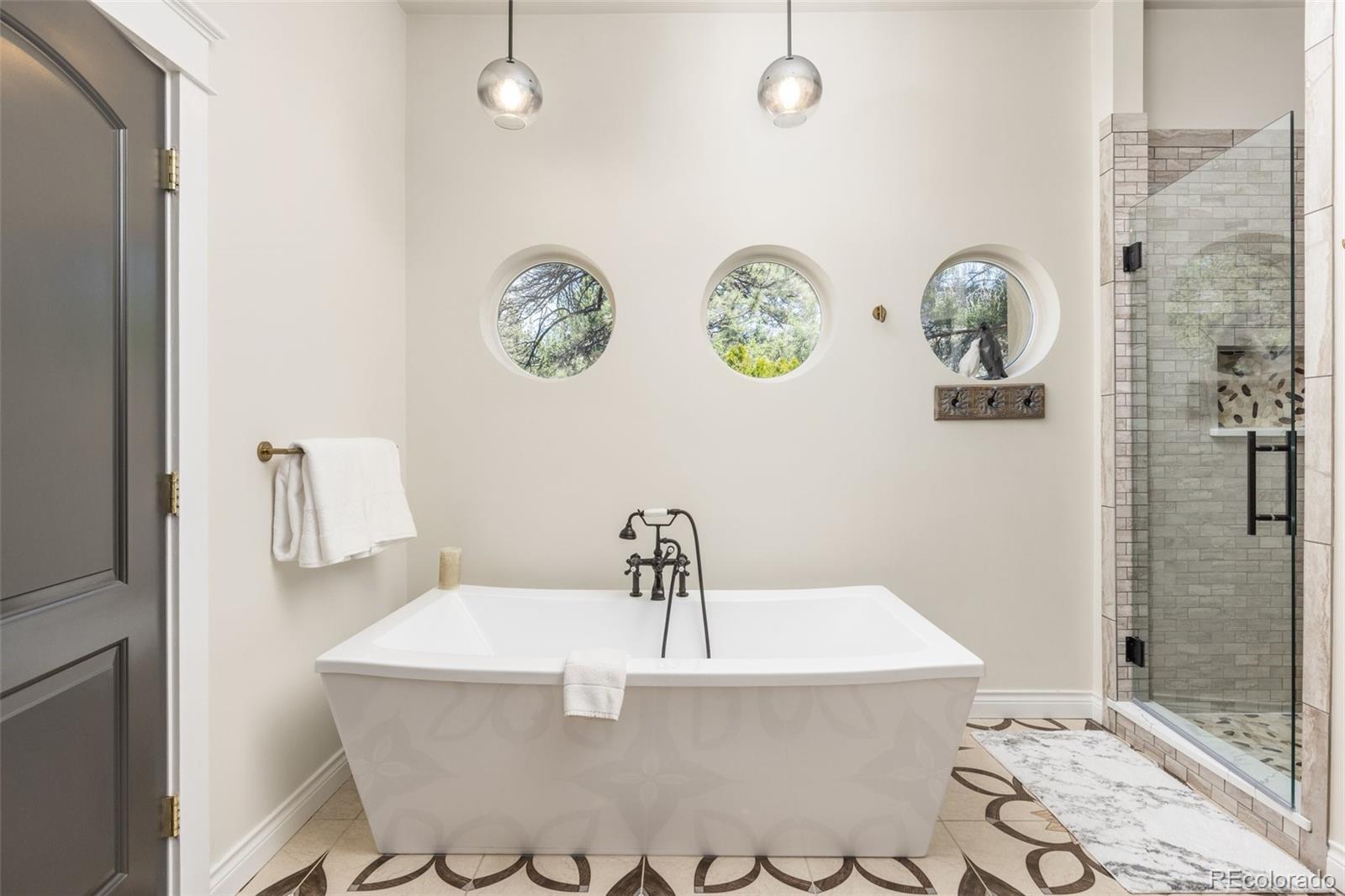 1669 Apple Valley Road Lyons, CO 80540 - Photo 42 of 48 a bathroom with a sink and a mirror