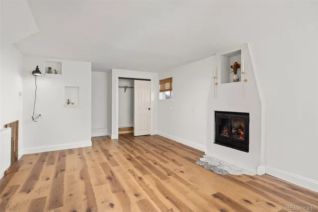 a view of a livingroom with a fireplace
