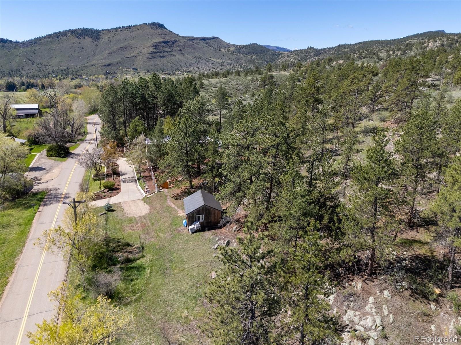 1669 Apple Valley Road Lyons, CO 80540 - Photo 5 of 48 a view of city and mountain