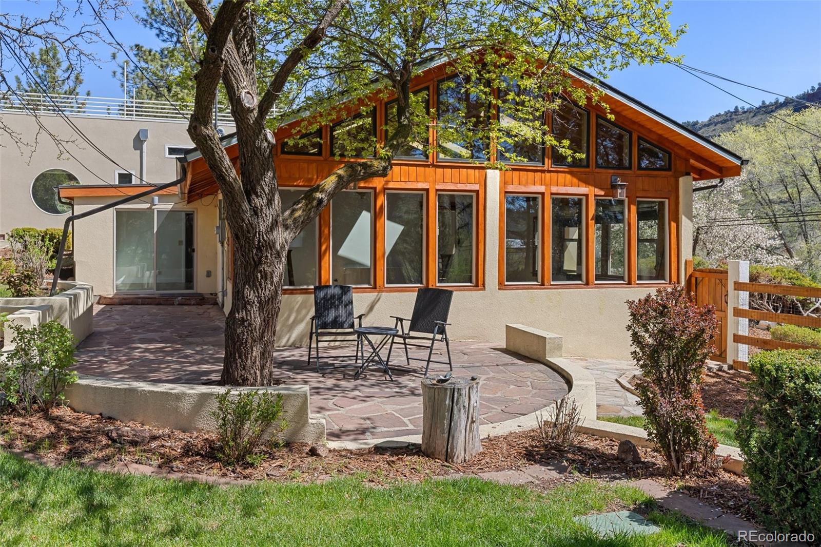 1669 Apple Valley Road Lyons, CO 80540 - Photo 8 of 48 a view of a house with backyard and sitting area