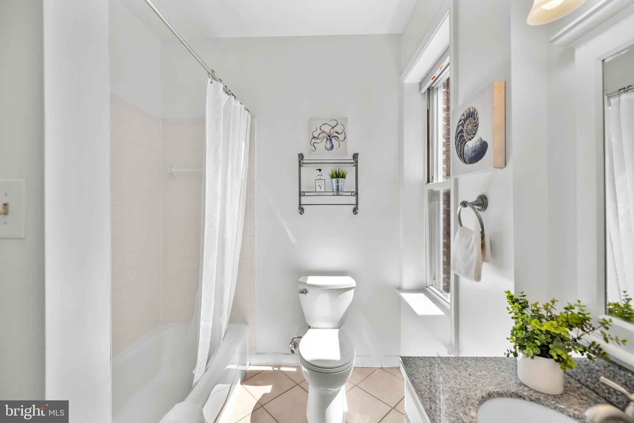 661 F Street Northeast Washington, DC 20002 - Photo 47 of 64 a bathroom with a toilet and a shower
