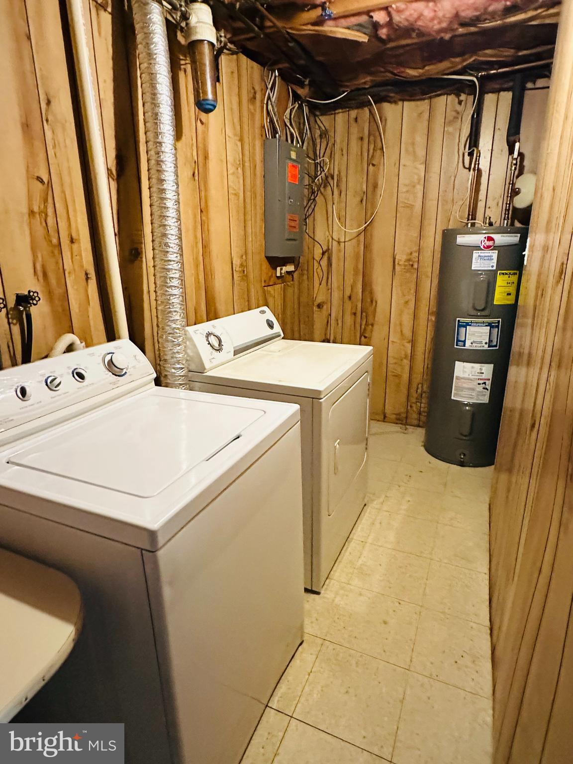 6820 Farmbrook Court Frederick, MD 21703 - Photo 16 of 17 a utility room with dryer and washer