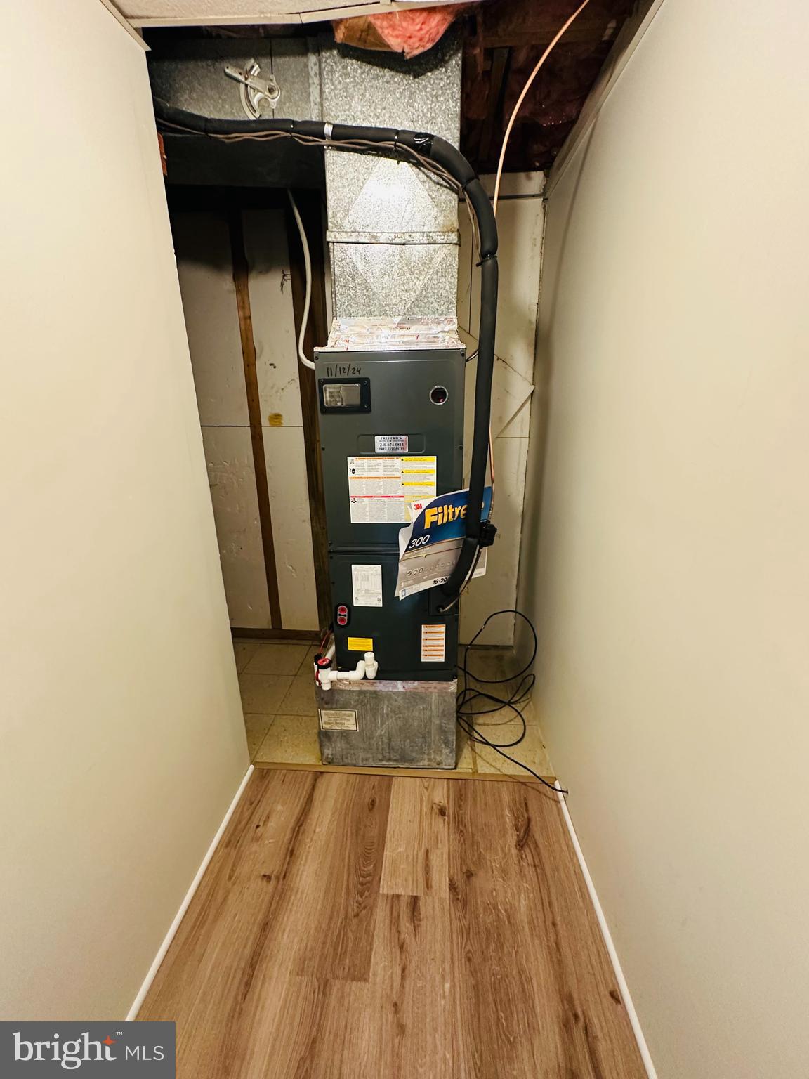 6820 Farmbrook Court Frederick, MD 21703 - Photo 17 of 17 a view of entryway with wooden floor