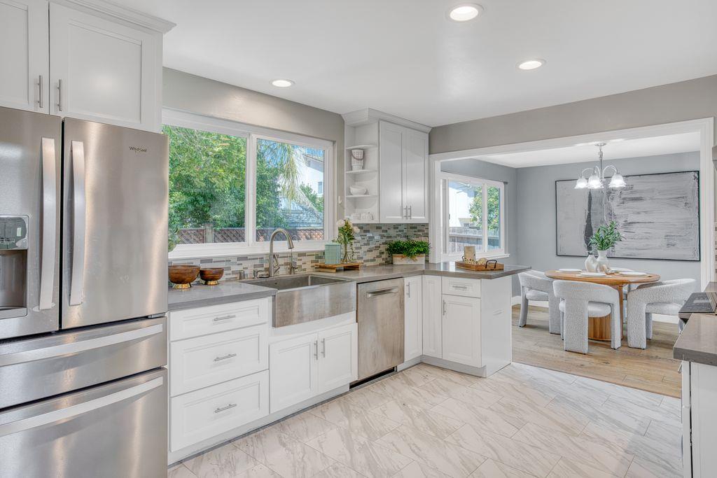 3530 Carlsbad Court Pleasanton, CA 94588 - Photo 23 of 44 a kitchen with counter top space sink and refrigerator