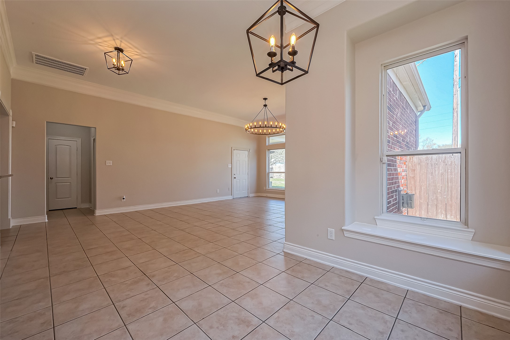19010 Grove Valley Trail Houston, TX 77084 - Photo 14 of 50 wooden floor in an empty room with a window