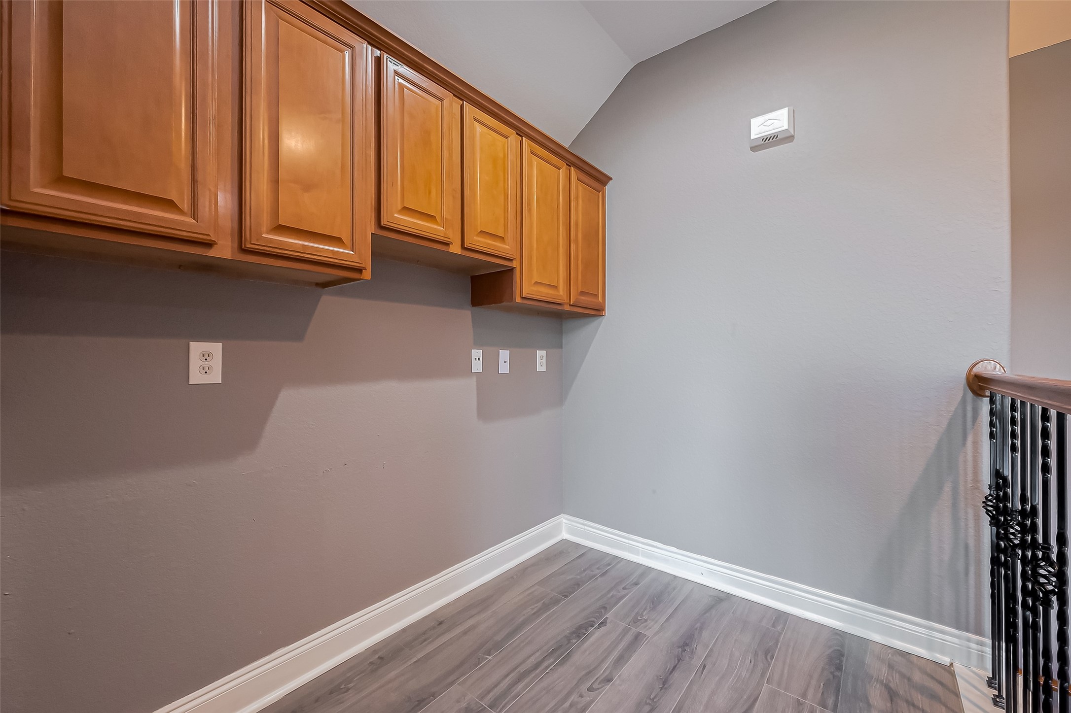 19010 Grove Valley Trail Houston, TX 77084 - Photo 30 of 50 a view of front door with wooden floor