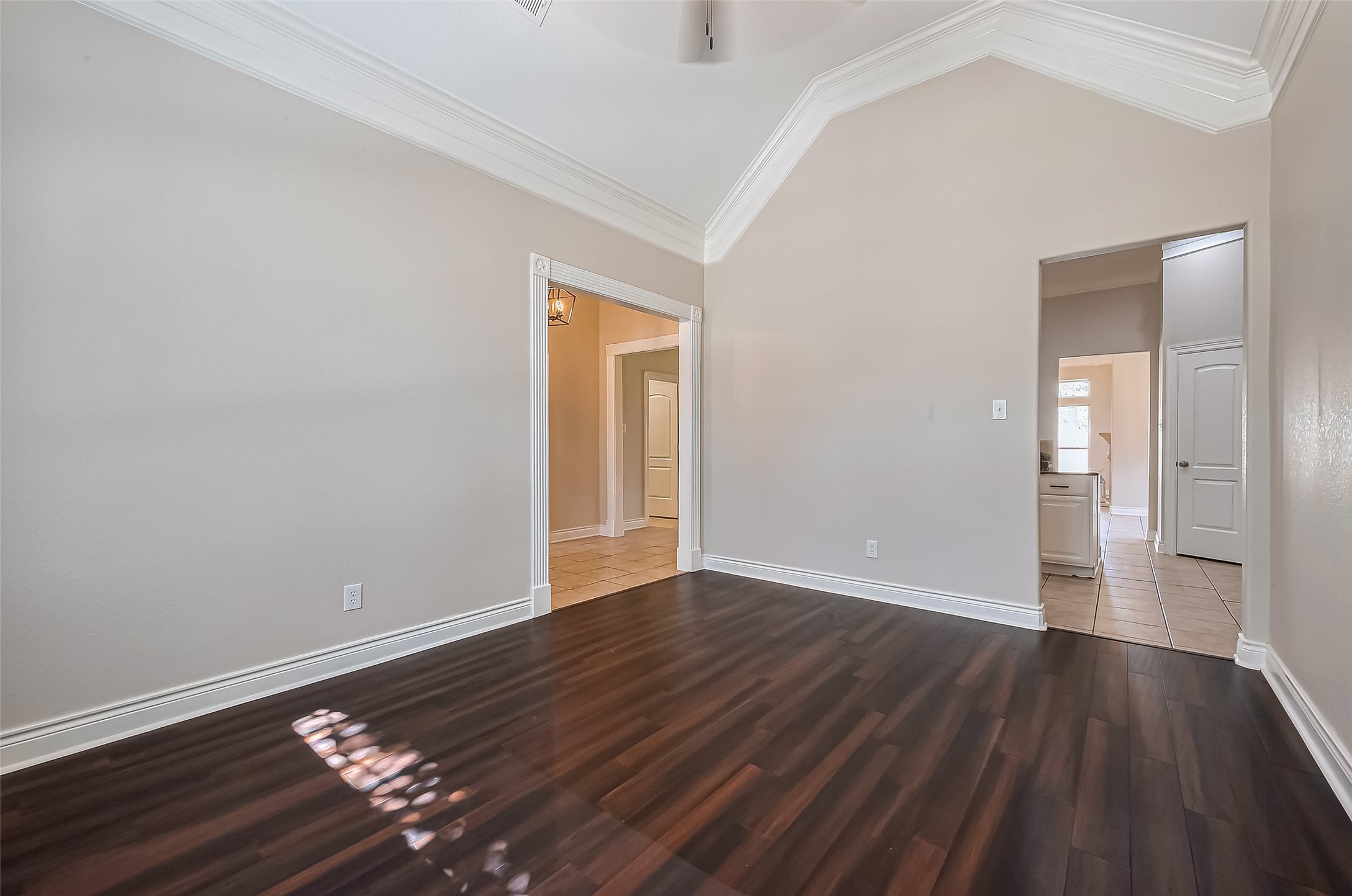19010 Grove Valley Trail Houston, TX 77084 - Photo 6 of 50 wooden floor in an empty room with a window