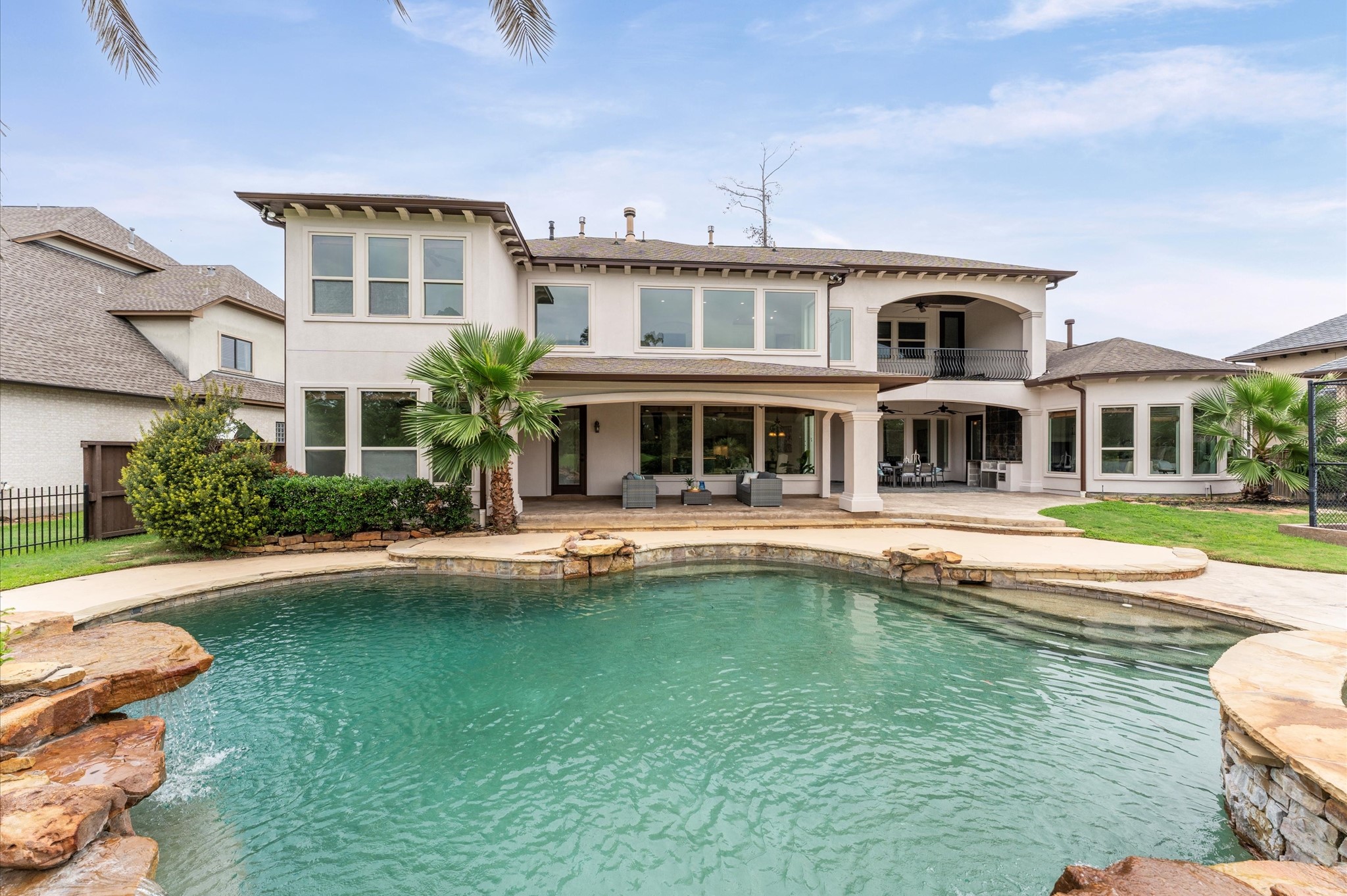 6623 Green Gable Manor Spring, TX 77389 - Photo 27 of 27 a front view of a house with swimming pool having outdoor seating