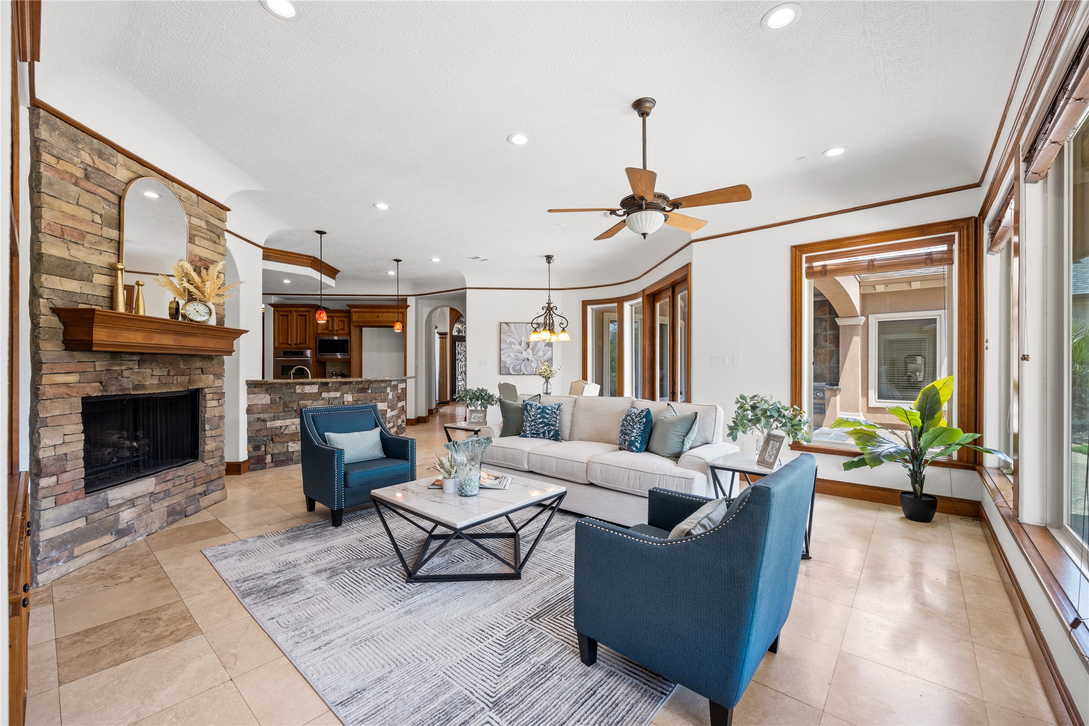 6623 Green Gable Manor Spring, TX 77389 - Photo 8 of 27 a living room with furniture a window and a fireplace
